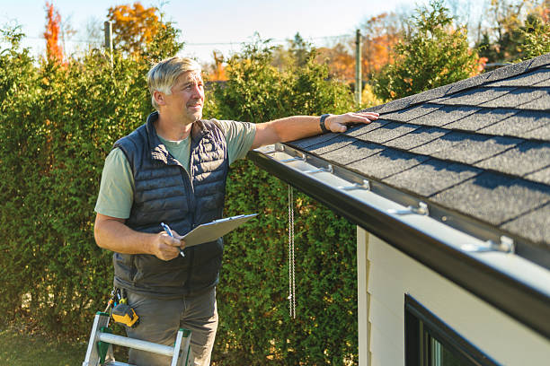 Professional Roofing technician working in Farley, IA